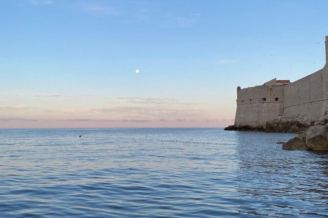 Dubrovnik 45 minute Panoramic Cruise - Old Town walls from the sea: Buza, cafes, Hilton, and Lovrijenac in one loop
