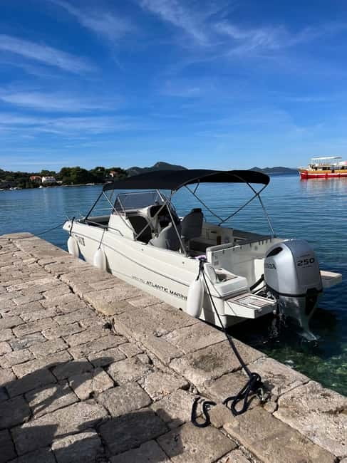 Dubrovnik: Blue Cave Tour by Speedboat with Small Group - Entering the Blue Cave on Kolocep: where the color comes from
