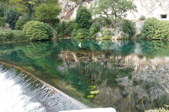 Dubrovnik City Tour: Panorama Drive & Sightseeing Walk - Buža Gate and the wall line: seeing the Old Town before you enter it