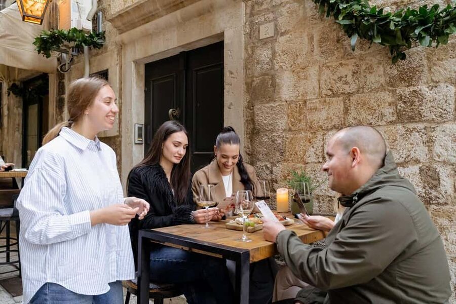 Dubrovnik Old Town: Night tour with History, Wine & Bites - Wine Stop: Two Glasses of Croatian White and Red