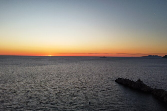 Dubrovnik Romantic Sunset Boat Tour - The Grebeni Lighthouse moment: the calm highlight of the route
