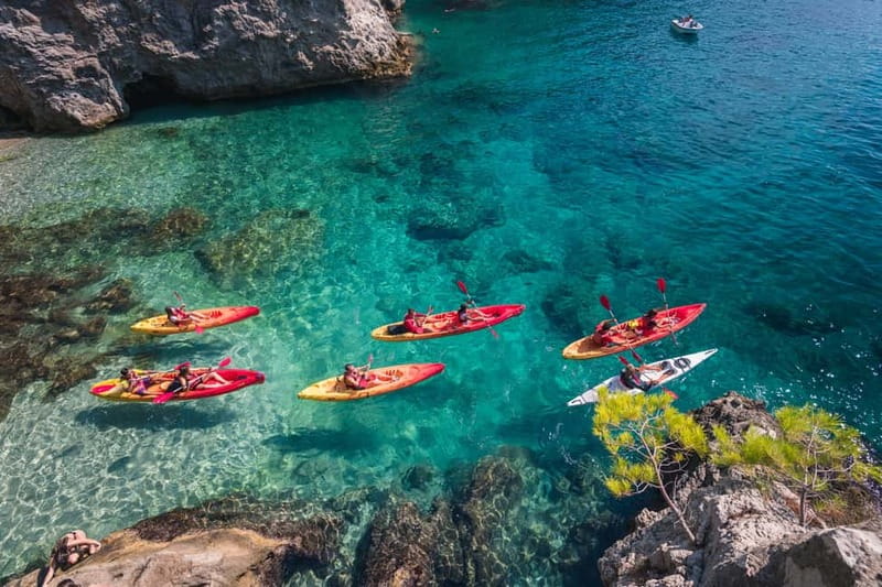 Dubrovnik: Sea Kayaking&Snorkelling Guided Day/Sunset Tours - Guides, safety boat, and how the day stays controlled