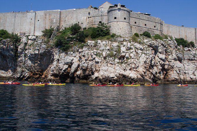 Dubrovnik: Sunset Kayaking & Snorkeling with water &wine - The end of the paddle: wine, snack, and the last city-wall look
