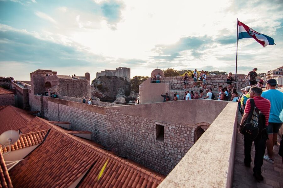 Dubrovnik: Walls and Wars Walking Tour - Meeting point: the orange umbrella near Pile