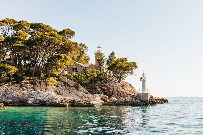 From Dubrovnik: Premium Three Island Cruise with lunch and drinks - Koločep’s quiet finish: calm streets and a beach by the harbor
