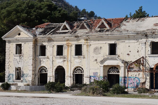 Guided Tour to Kupari From Holiday Resort to War Zone - Stop 2 at Beach Kupari: where the mood shifts back to the coast