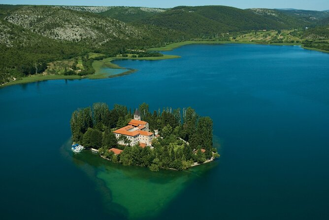 Krka National Park - Private Excursion from Dubrovnik with Mercedes Vehicle - Waterfall walks and swimming options: stairs, heat, and water levels