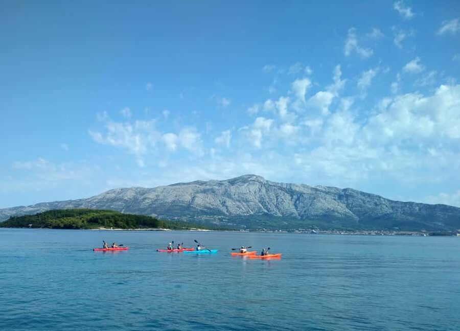 Lumbarda - Sunset Kayak Tour with a Picnic - Wine and Sweets - The quarry island stop: where old stonework meets sea views