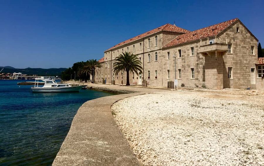 Lumbarda - Sunset Kayak Tour with a Picnic - Wine and Sweets - The 14th-century monastery island, with deer wandering nearby